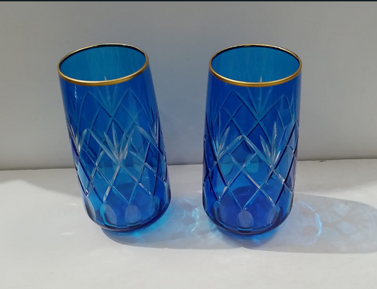 Blue and gold water glasses