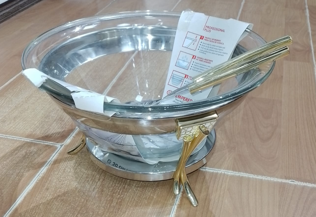 Salad bowl with serving spoons