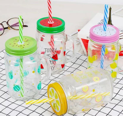Glass mason jars with a straw